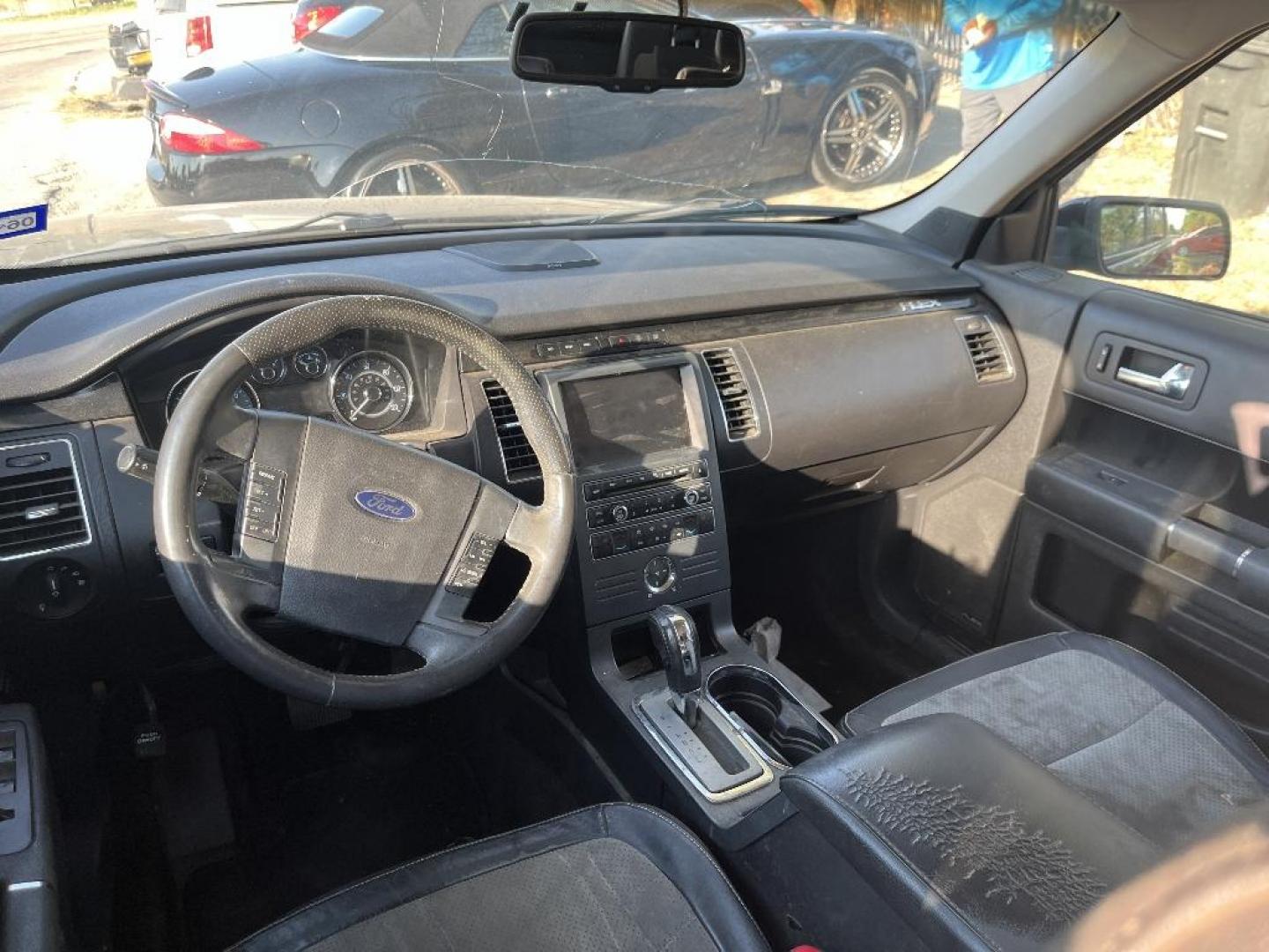 2011 BLACK FORD FLEX Limited FWD (2FMGK5DC8BB) with an 3.5L V6 DOHC 24V engine, AUTOMATIC transmission, located at 2303 West Mt. Houston, Houston, 77038, (281) 507-3956, 29.771597, -95.339569 - Photo#5
