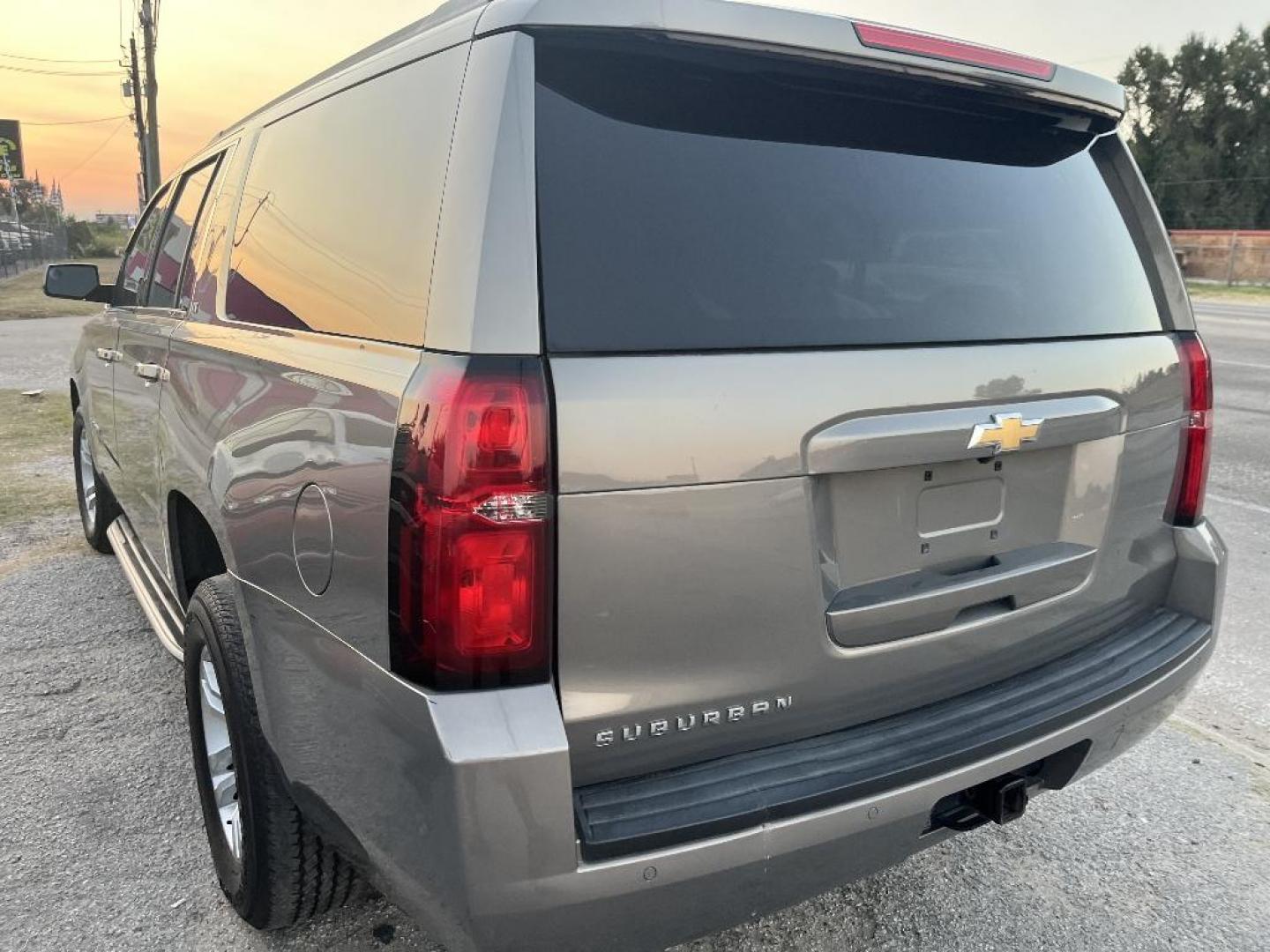 2017 TAN CHEVROLET SUBURBAN LT 2WD (1GNSCHKC4HR) with an 5.3L V8 OHV 16V engine, AUTOMATIC transmission, located at 2303 West Mt. Houston, Houston, 77038, (281) 507-3956, 29.771597, -95.339569 - Photo#5