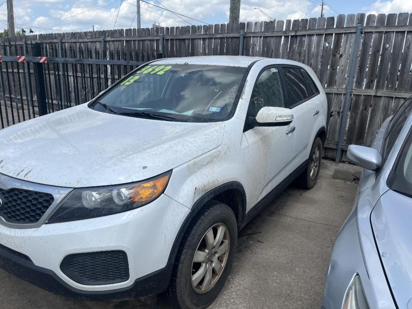 2013 WHITE KIA SORENTO LX 2WD (5XYKT3A15DG) with an 2.4L L4 DOHC 16V engine, AUTOMATIC transmission, located at 2303 West Mt. Houston, Houston, 77038, (281) 507-3956, 29.771597, -95.339569 - Photo#0
