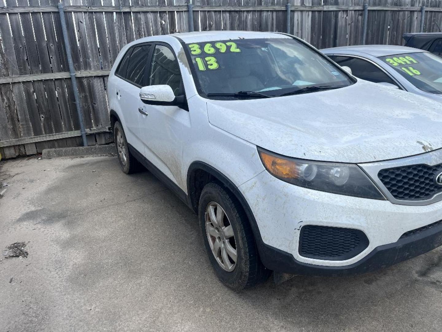 2013 WHITE KIA SORENTO LX 2WD (5XYKT3A15DG) with an 2.4L L4 DOHC 16V engine, AUTOMATIC transmission, located at 2303 West Mt. Houston, Houston, 77038, (281) 507-3956, 29.771597, -95.339569 - Photo#1