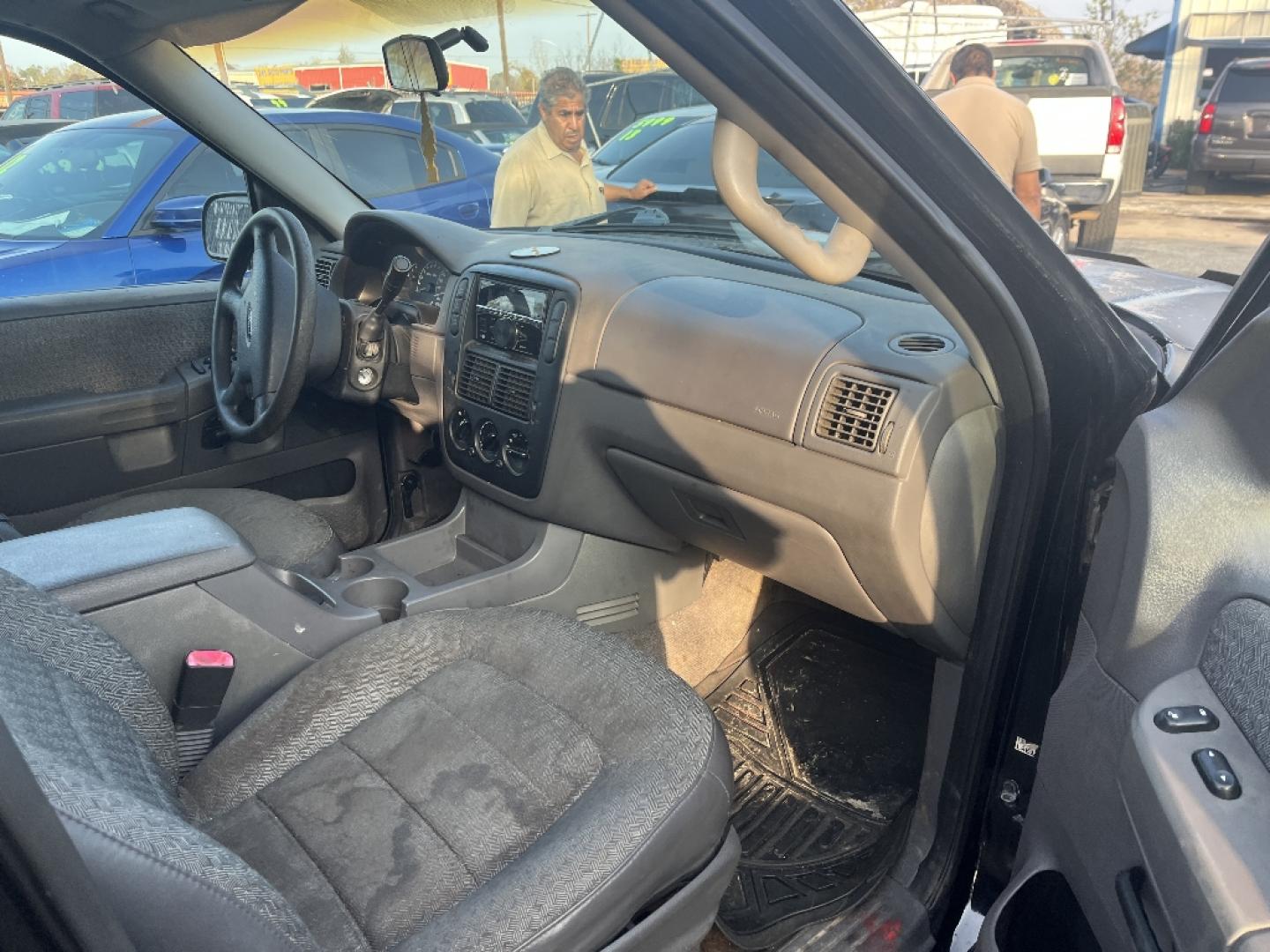 2002 BLACK FORD EXPLORER XLS 4WD (1FMZU72E22Z) with an 4.0L V6 SOHC 16V engine, AUTOMATIC transmission, located at 2303 West Mt. Houston, Houston, 77038, (281) 507-3956, 29.771597, -95.339569- Photo#1
