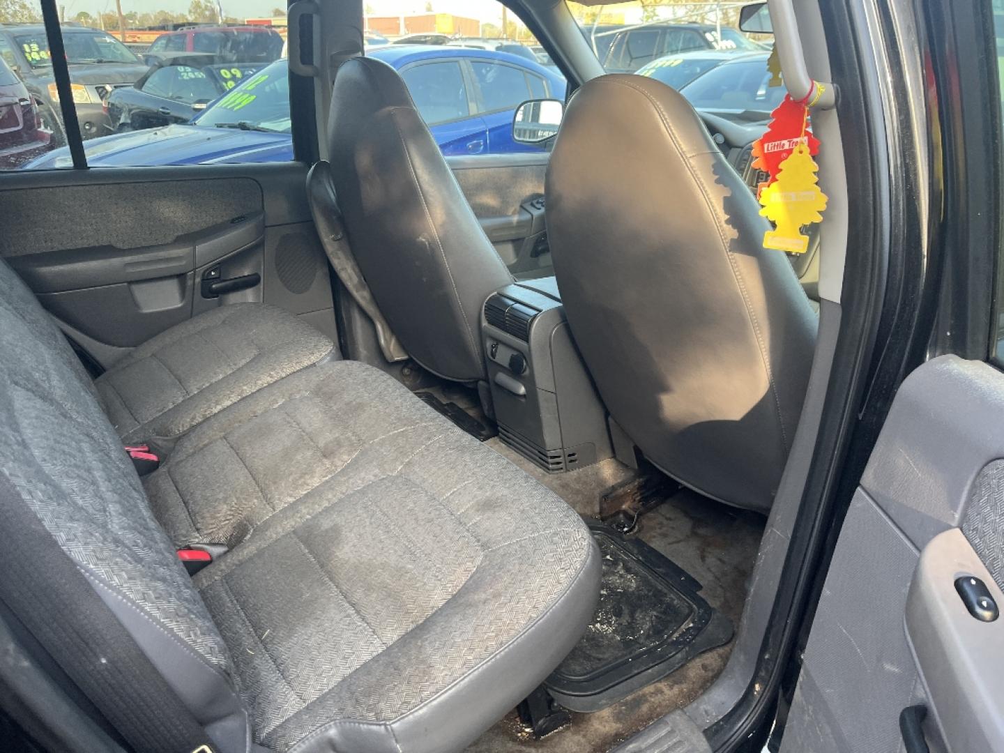 2002 BLACK FORD EXPLORER XLS 4WD (1FMZU72E22Z) with an 4.0L V6 SOHC 16V engine, AUTOMATIC transmission, located at 2303 West Mt. Houston, Houston, 77038, (281) 507-3956, 29.771597, -95.339569- Photo#2