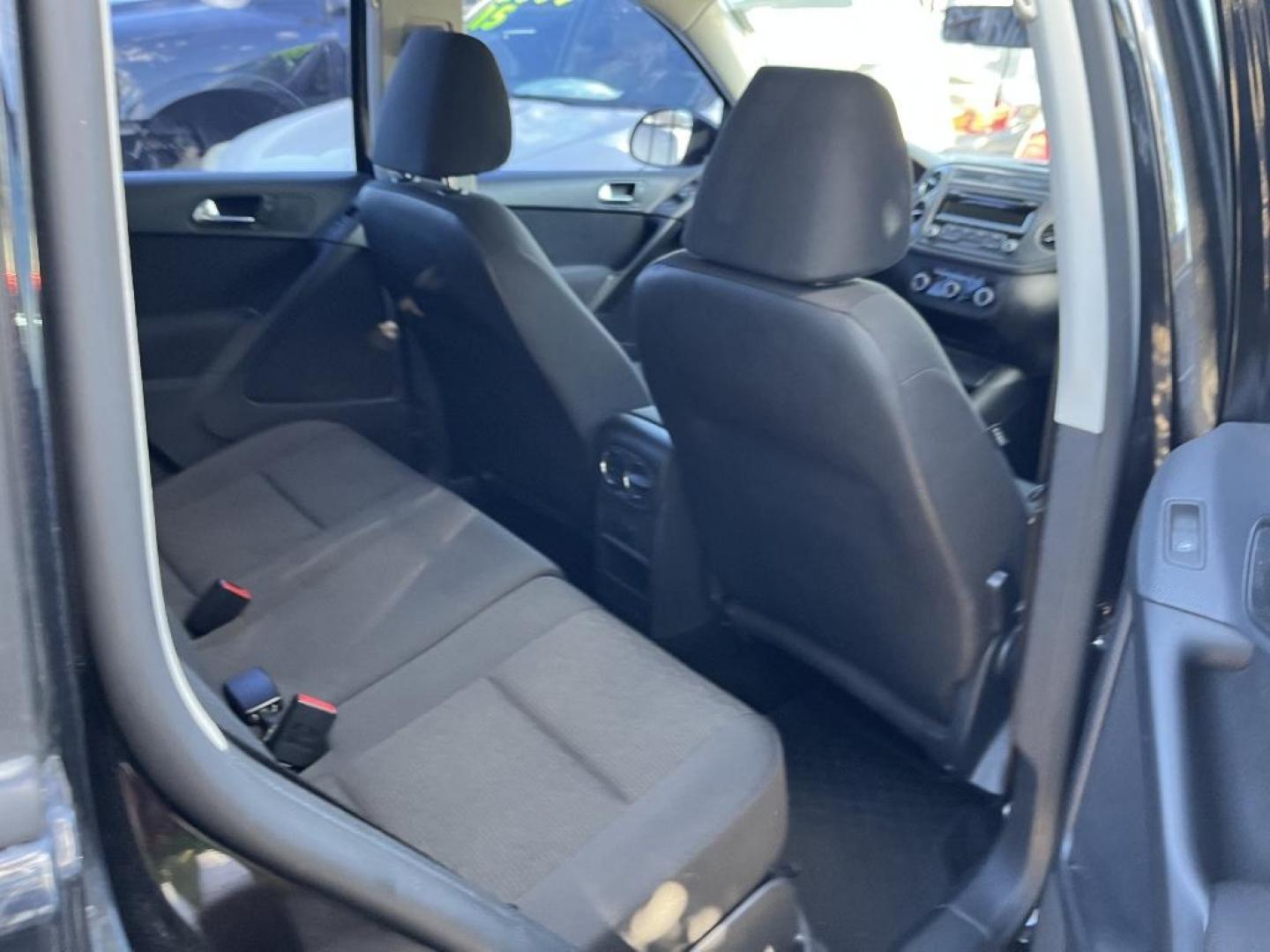 2012 BLACK VOLKSWAGEN TIGUAN S 4Motion (WVGBV7AX5CW) with an 2.0L L4 DOHC 16V TURBO engine, AUTOMATIC transmission, located at 2303 West Mt. Houston, Houston, 77038, (281) 507-3956, 29.771597, -95.339569 - Photo#2