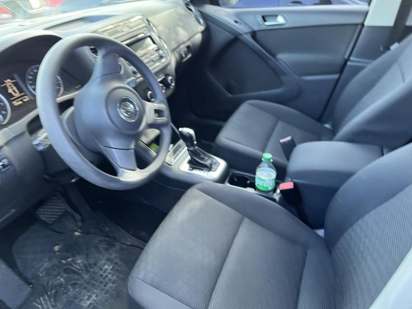 2012 BLACK VOLKSWAGEN TIGUAN S 4Motion (WVGBV7AX5CW) with an 2.0L L4 DOHC 16V TURBO engine, AUTOMATIC transmission, located at 2303 West Mt. Houston, Houston, 77038, (281) 507-3956, 29.771597, -95.339569 - Photo#3