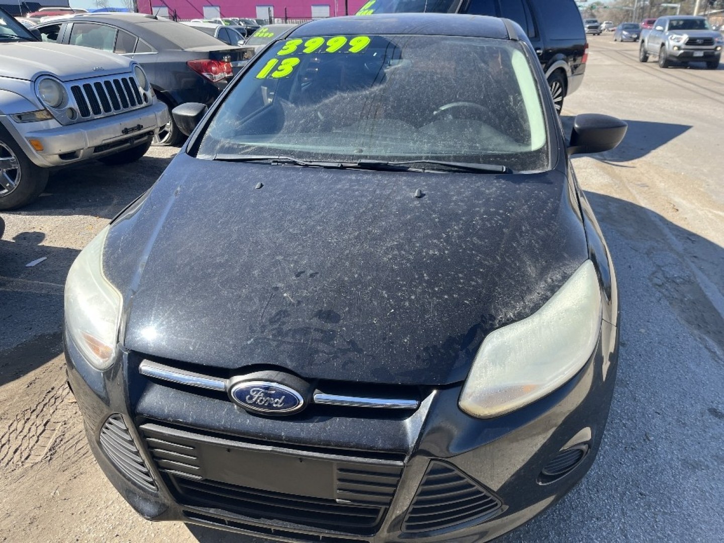 2013 BLACK FORD FOCUS S Sedan (1FADP3E29DL) with an 2.0L L4 DOHC 16V engine, AUTOMATIC transmission, located at 2303 West Mt. Houston, Houston, 77038, (281) 507-3956, 29.771597, -95.339569- Photo#0