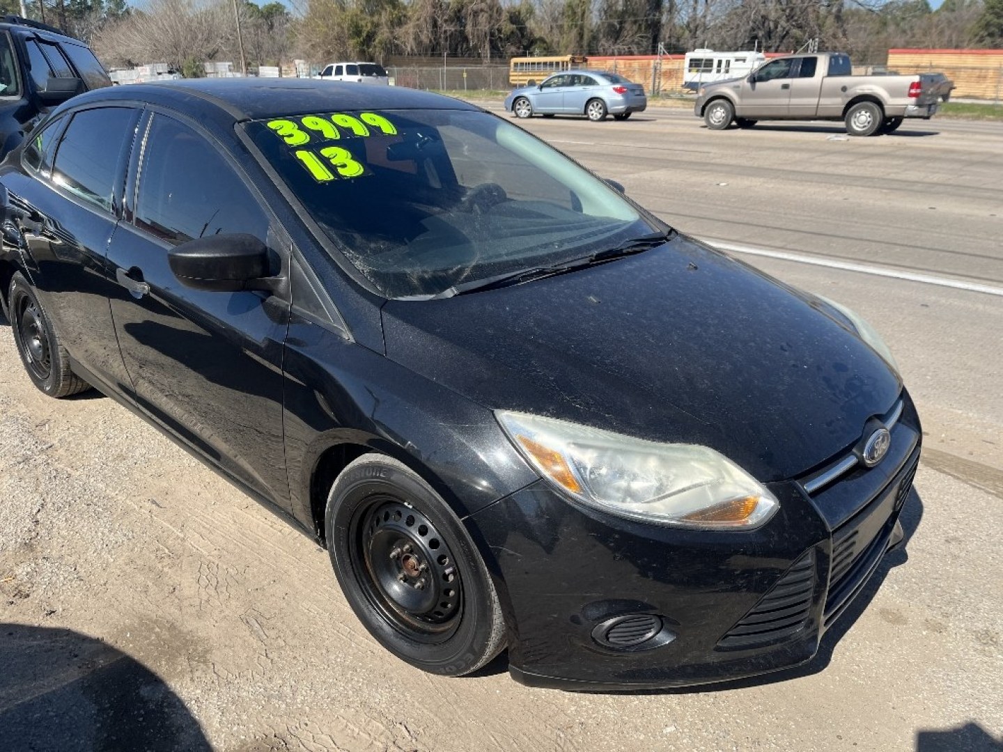 2013 BLACK FORD FOCUS S Sedan (1FADP3E29DL) with an 2.0L L4 DOHC 16V engine, AUTOMATIC transmission, located at 2303 West Mt. Houston, Houston, 77038, (281) 507-3956, 29.771597, -95.339569- Photo#2