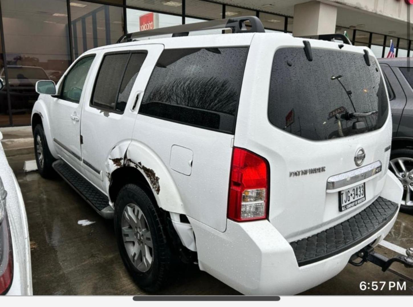 2012 WHITE NISSAN PATHFINDER LE 2WD (5N1AR1NN3CC) with an 4.0L V6 DOHC 24V engine, AUTOMATIC transmission, located at 2303 West Mt. Houston, Houston, 77038, (281) 507-3956, 29.771597, -95.339569 - Photo#1
