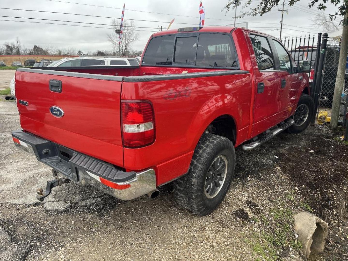 2005 RED FORD F-150 FX4 SuperCrew 4WD (1FTPW14555K) with an 5.4L V8 SOHC 16V engine, AUTOMATIC transmission, located at 2303 West Mt. Houston, Houston, 77038, (281) 507-3956, 29.771597, -95.339569 - Photo#1