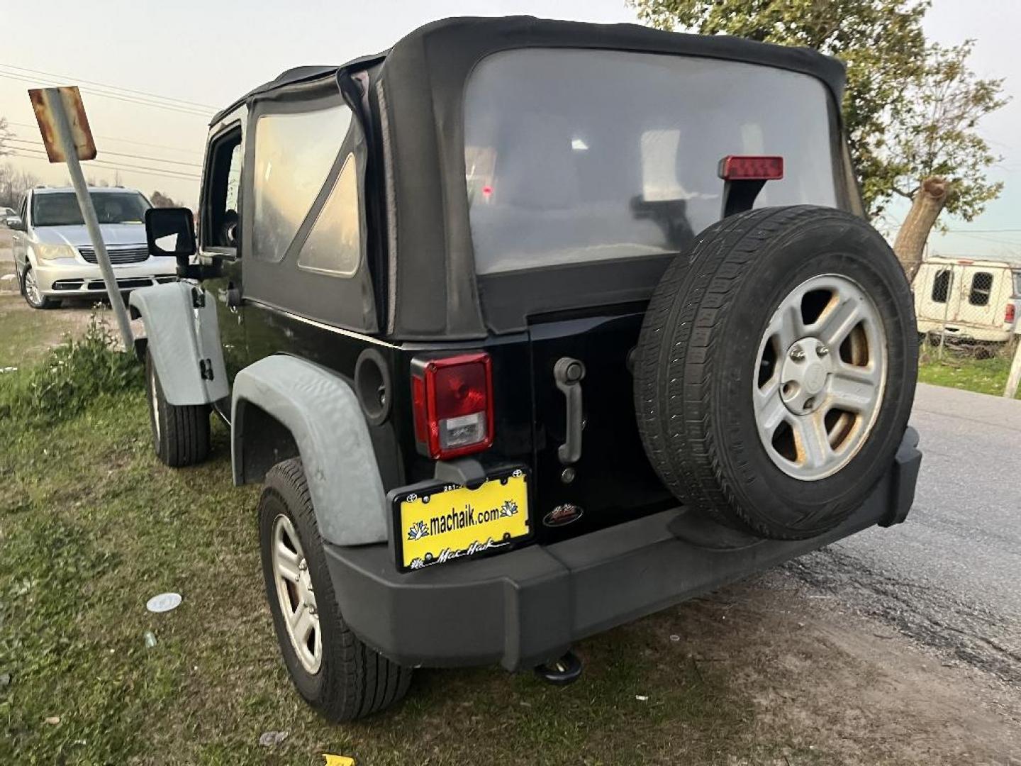 2011 GRAY JEEP WRANGLER Sport 4WD (1J4AA2D17BL) with an 3.8L V6 OHV 12V engine, MANUAL transmission, located at 2303 West Mt. Houston, Houston, 77038, (281) 507-3956, 29.771597, -95.339569 - Photo#2