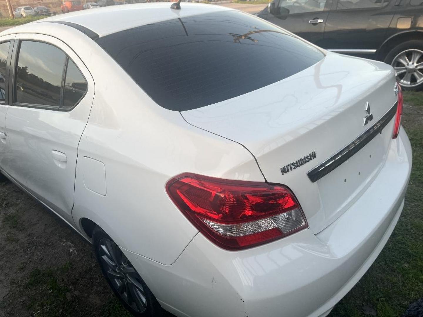 2019 WHITE MITSUBISHI MIRAGE G4 ES 5M (ML32F3FJ4KH) with an 1.2L L3 DOHC engine, AUTOMATIC transmission, located at 2303 West Mt. Houston, Houston, 77038, (281) 507-3956, 29.771597, -95.339569 - Photo#4