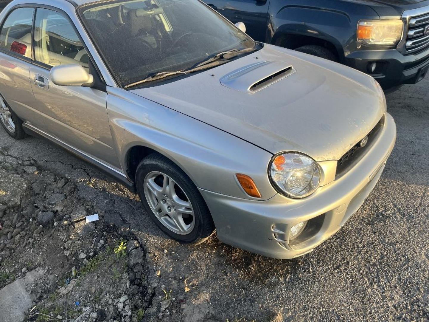 2003 GRAY SUBARU IMPREZA WRX (JF1GD29663G) with an 2.0L H4 DOHC 16V TURBO engine, MANUAL transmission, located at 2303 West Mt. Houston, Houston, 77038, (281) 507-3956, 29.771597, -95.339569 - Photo#0
