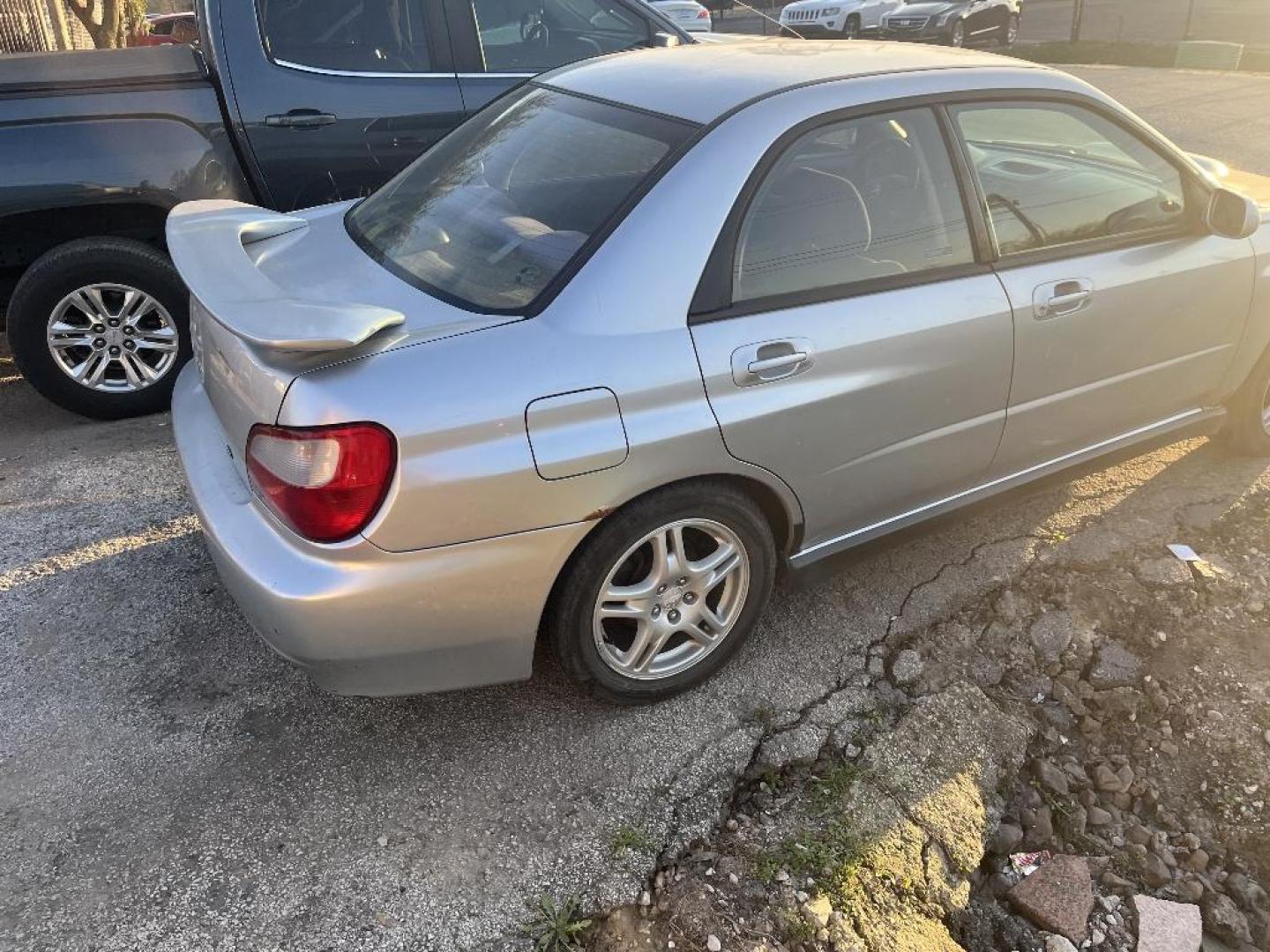 2003 GRAY SUBARU IMPREZA WRX (JF1GD29663G) with an 2.0L H4 DOHC 16V TURBO engine, MANUAL transmission, located at 2303 West Mt. Houston, Houston, 77038, (281) 507-3956, 29.771597, -95.339569 - Photo#3