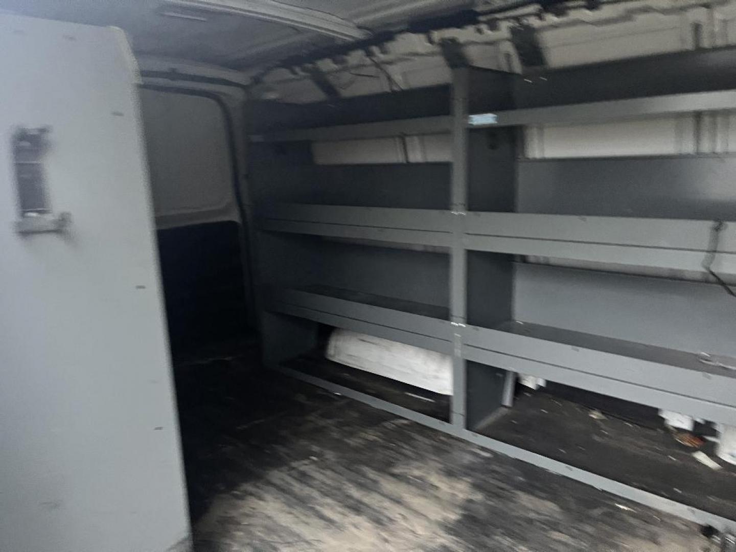 2014 WHITE CHEVROLET EXPRESS 2500 Cargo (1GCWGFCG9E1) with an 6.0L V8 OHV 16V FFV engine, AUTOMATIC transmission, located at 2303 West Mt. Houston, Houston, 77038, (281) 507-3956, 29.771597, -95.339569 - Photo#9