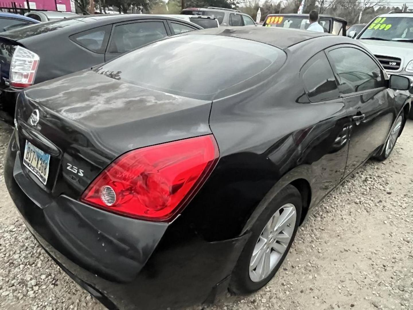 2010 BLACK NISSAN ALTIMA 2.5 S 6M/T Coupe (1N4AL2EP5AC) with an 2.5L L4 DOHC 16V engine, AUTOMATIC transmission, located at 2303 West Mt. Houston, Houston, 77038, (281) 507-3956, 29.771597, -95.339569 - Photo#1