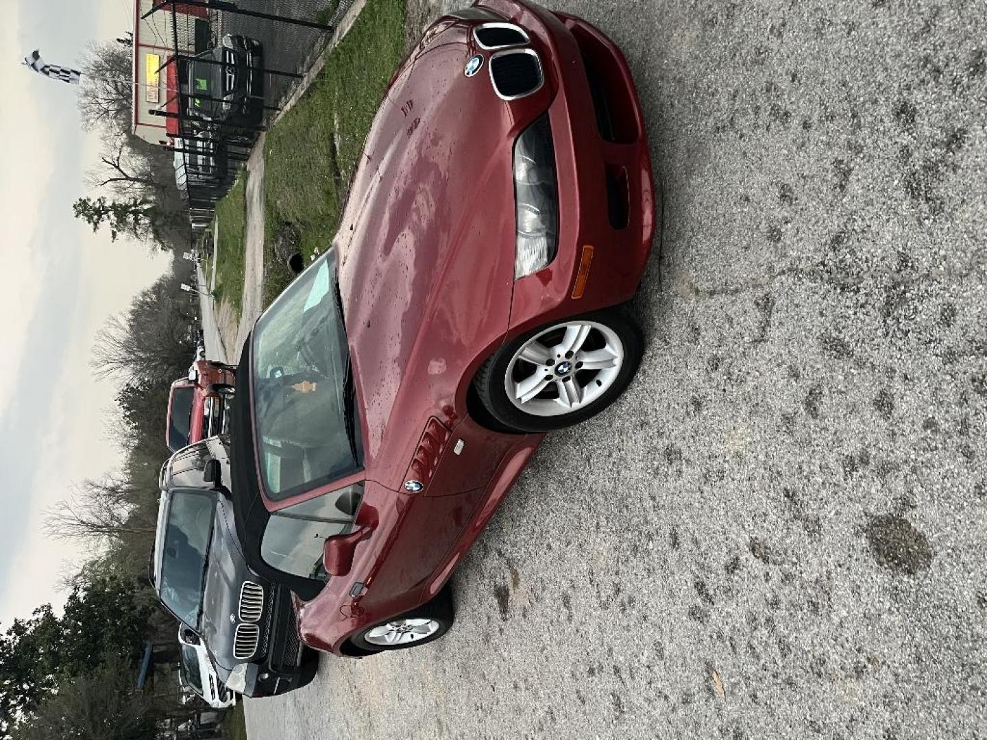2000 RED BMW Z3 2.3 Roadster (4USCH9342YL) with an 2.5L V6 DOHC 24V engine, AUTOMATIC transmission, located at 2303 West Mt. Houston, Houston, 77038, (281) 507-3956, 29.771597, -95.339569 - Photo#3