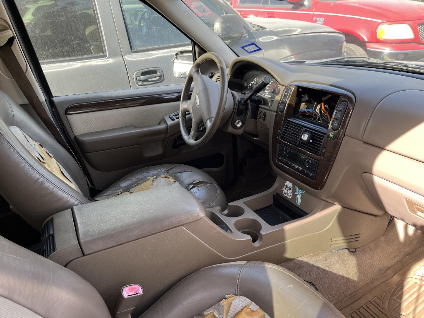 2002 BLUE FORD EXPLORER Eddie Bauer 4WD (1FMZU74E82U) with an 4.0L V6 SOHC 16V engine, AUTOMATIC transmission, located at 2303 West Mt. Houston, Houston, 77038, (281) 507-3956, 29.771597, -95.339569- Photo#2