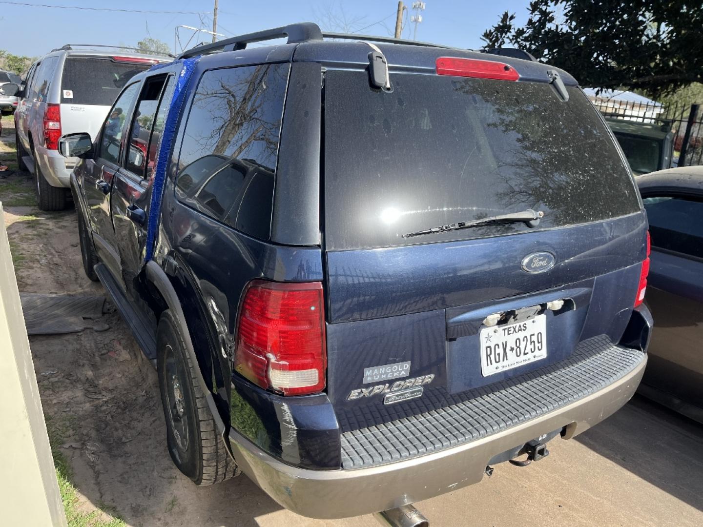 2002 BLUE FORD EXPLORER Eddie Bauer 4WD (1FMZU74E82U) with an 4.0L V6 SOHC 16V engine, AUTOMATIC transmission, located at 2303 West Mt. Houston, Houston, 77038, (281) 507-3956, 29.771597, -95.339569- Photo#4