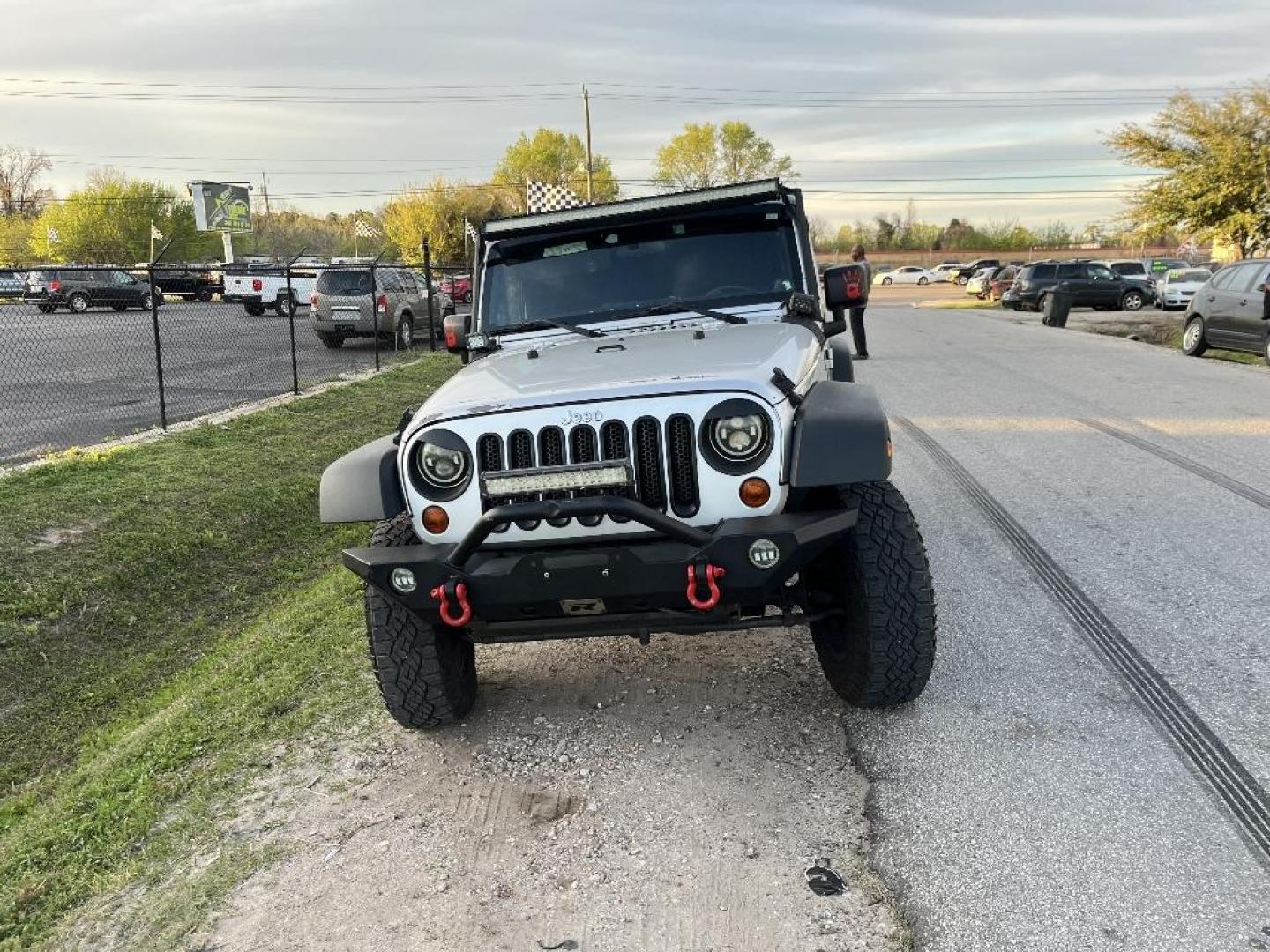 2012 SILVER JEEP WRANGLER Sport 4WD (1C4GJWAG6CL) with an 3.6L V6 DOHC 24V FFV engine, AUTOMATIC transmission, located at 2303 West Mt. Houston, Houston, 77038, (281) 507-3956, 29.771597, -95.339569 - Photo#0