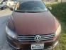 2014 MAROON VOLKSWAGEN PASSAT 1.8T Wolfsburg AT (1VWAT7A33EC) with an 1.8L L4 engine, AUTOMATIC transmission, located at 2303 West Mt. Houston, Houston, 77038, (281) 507-3956, 29.771597, -95.339569 - Photo#0