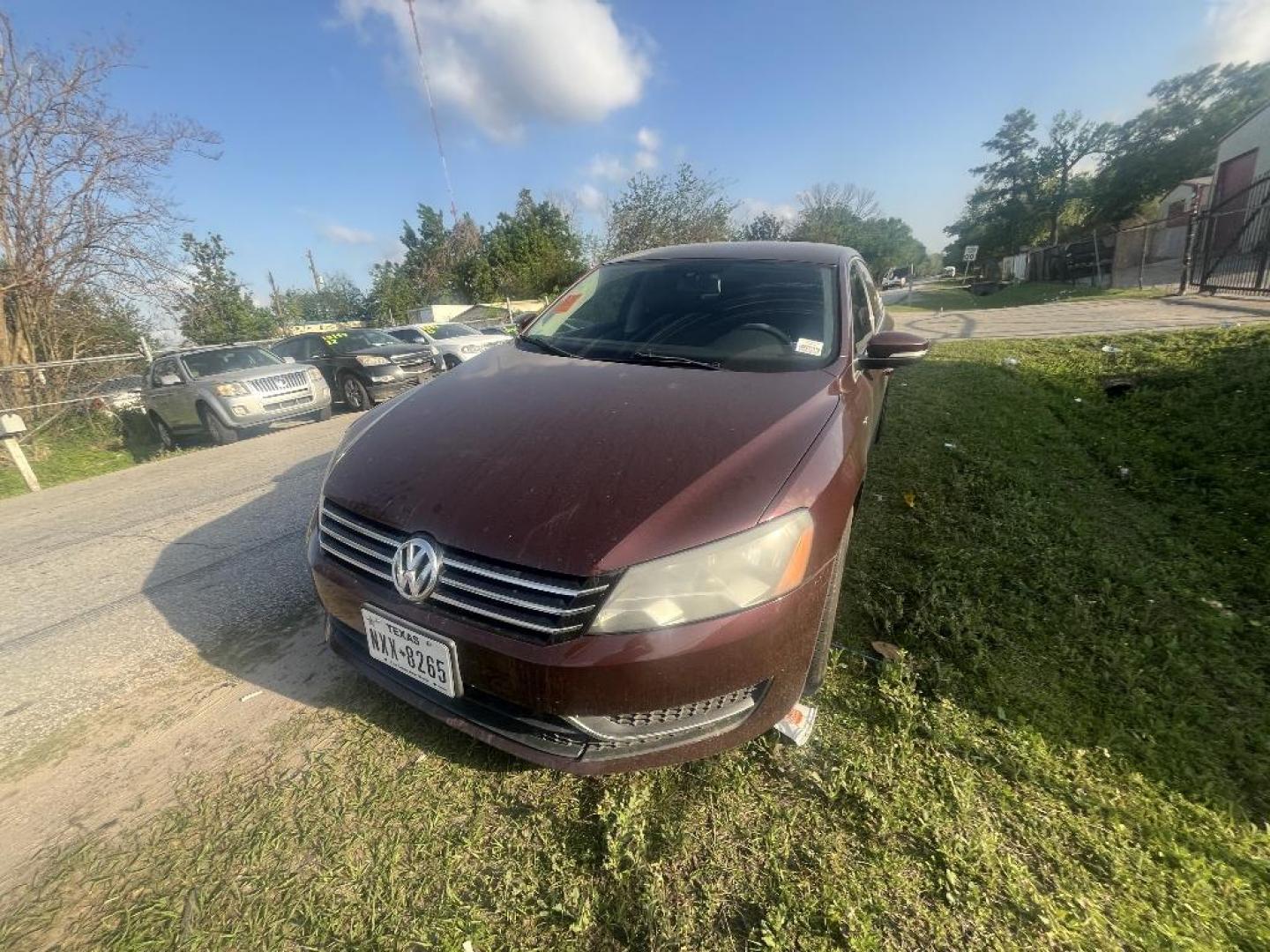 2014 MAROON VOLKSWAGEN PASSAT 1.8T Wolfsburg AT (1VWAT7A33EC) with an 1.8L L4 engine, AUTOMATIC transmission, located at 2303 West Mt. Houston, Houston, 77038, (281) 507-3956, 29.771597, -95.339569 - Photo#2