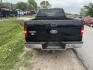 2007 BLACK FORD F-150 FX4 SuperCab (1FTPX14V67N) with an 5.4L V8 SOHC 24V FFV engine, AUTOMATIC transmission, located at 2303 West Mt. Houston, Houston, 77038, (281) 507-3956, 29.771597, -95.339569 - Photo#2