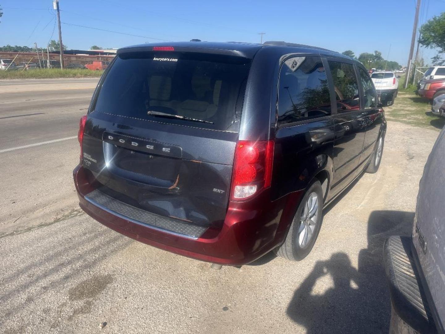 2014 BLACK DODGE GRAND CARAVAN SXT (2C4RDGCG6ER) with an 3.6L V6 DOHC 24V engine, AUTOMATIC transmission, located at 2303 West Mt. Houston, Houston, 77038, (281) 507-3956, 29.771597, -95.339569 - Photo#6