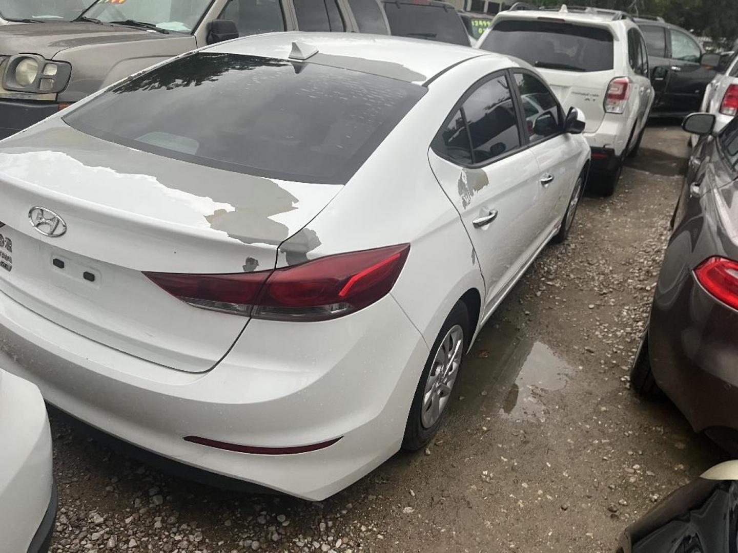 2017 WHITE HYUNDAI ELANTRA SE 6AT (5NPD74LFXHH) with an 1.8L L4 DOHC 16V engine, AUTOMATIC transmission, located at 2303 West Mt. Houston, Houston, 77038, (281) 507-3956, 29.771597, -95.339569 - Photo#4
