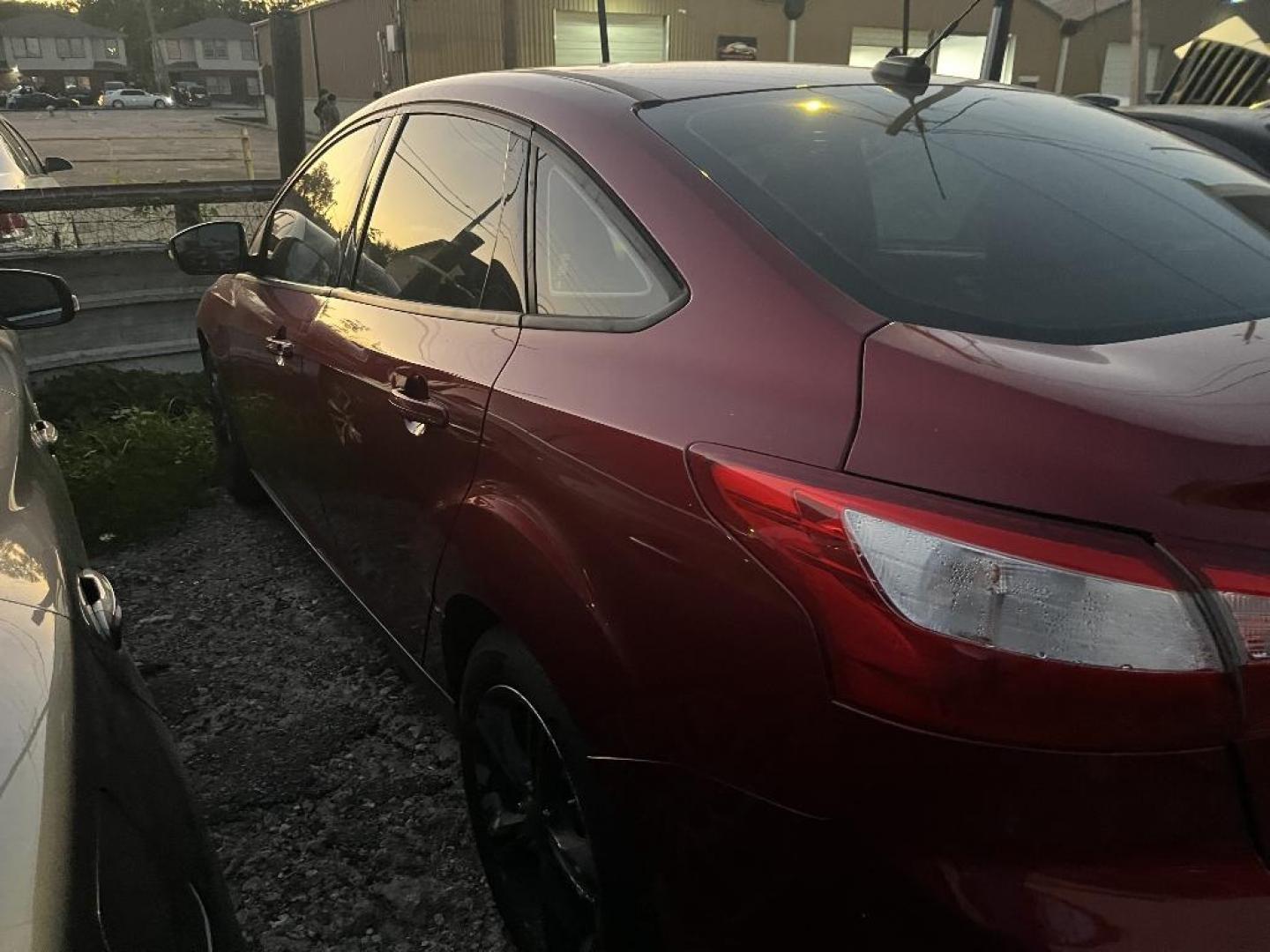 2013 RED FORD FOCUS SE Sedan (1FADP3F27DL) with an 2.0L L4 DOHC 16V engine, AUTOMATIC transmission, located at 2303 West Mt. Houston, Houston, 77038, (281) 507-3956, 29.771597, -95.339569 - Photo#3