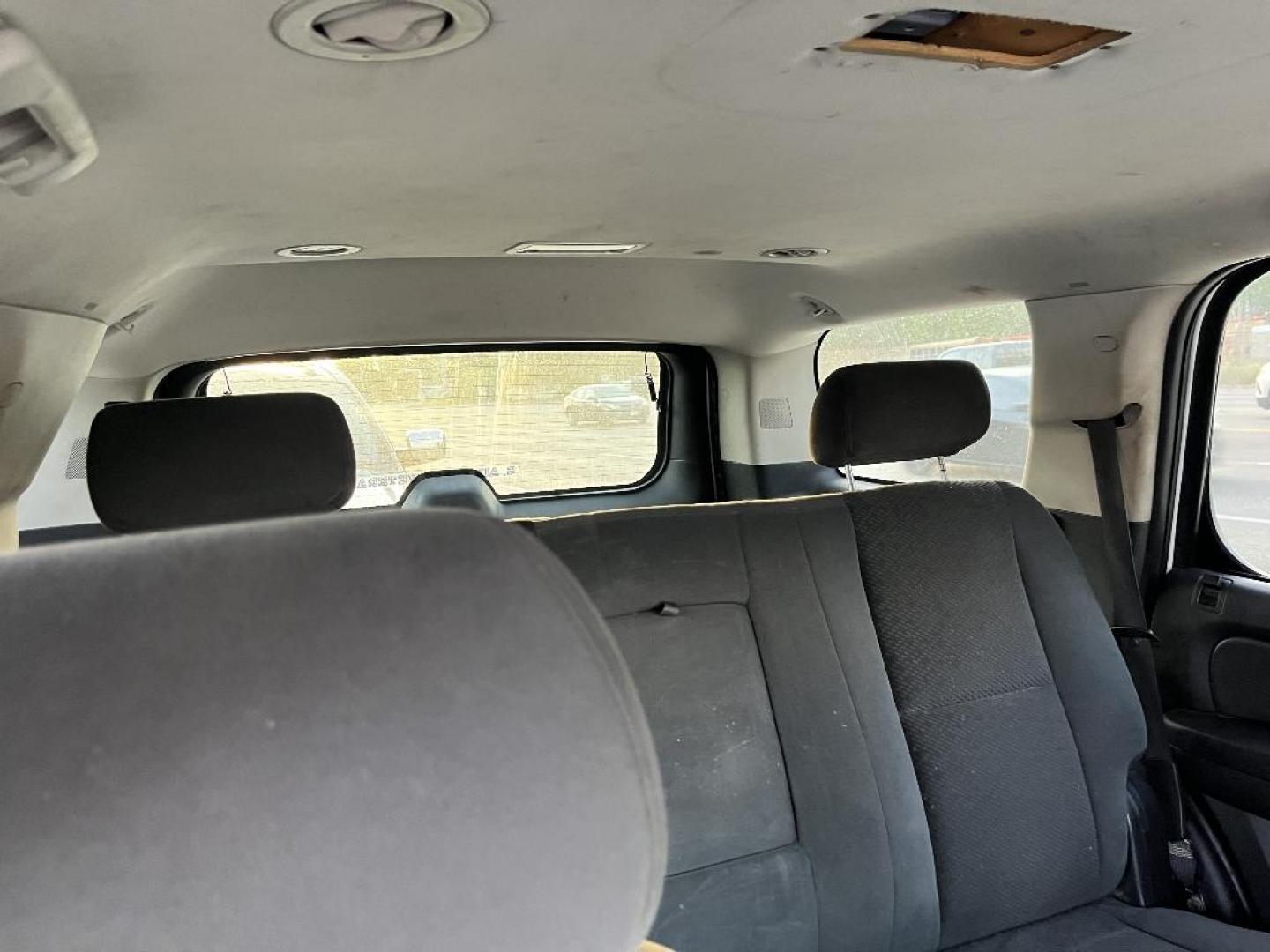 2007 WHITE CHEVROLET TAHOE LS 2WD (1GNFC13J77J) with an 5.3L V8 OHV 16V engine, AUTOMATIC transmission, located at 2303 West Mt. Houston, Houston, 77038, (281) 507-3956, 29.771597, -95.339569 - Photo#4