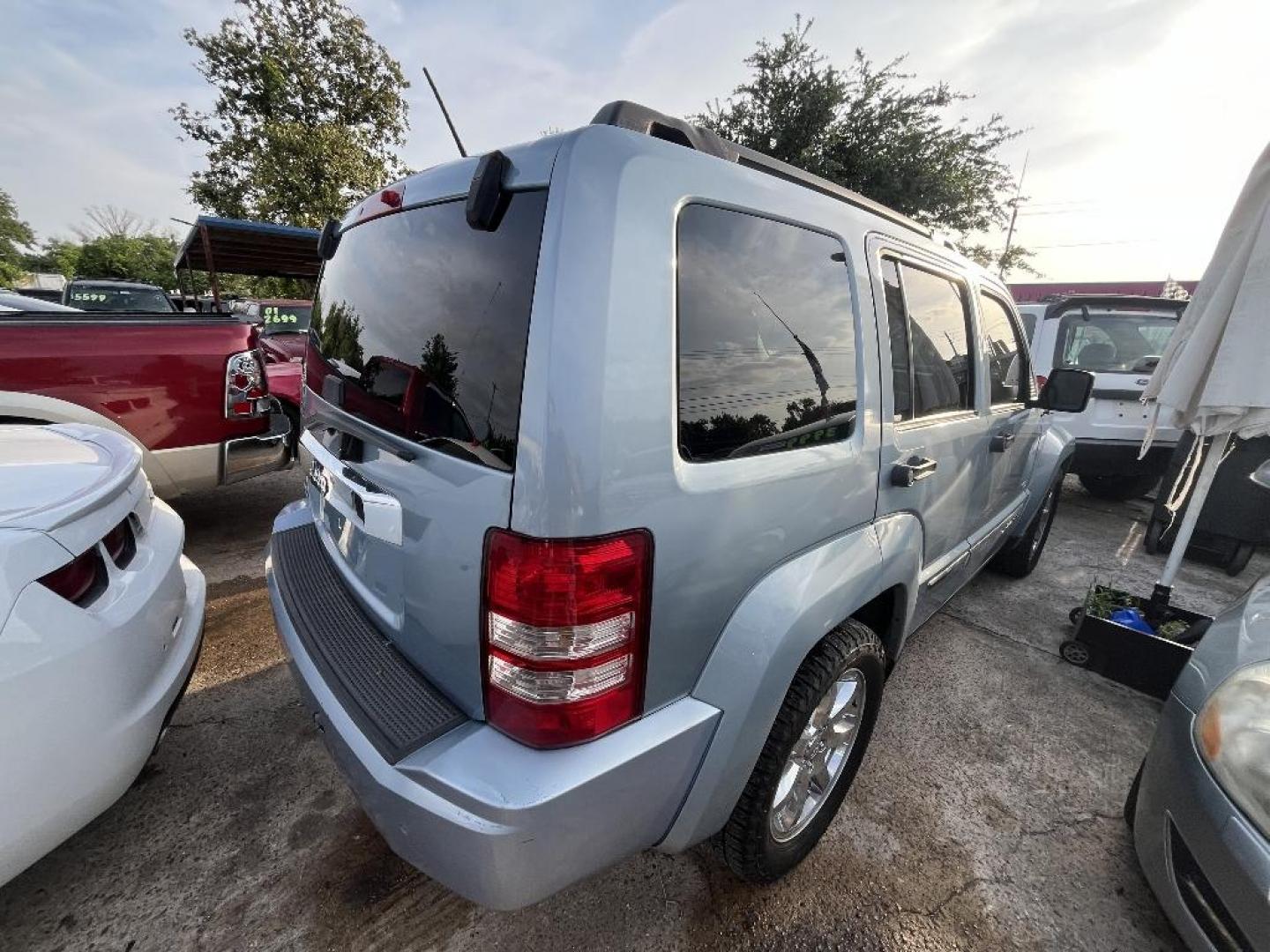 2012 BLUE JEEP LIBERTY Sport 4WD (1C4PJMAK8CW) with an 3.7L V6 SOHC 12V engine, AUTOMATIC transmission, located at 2303 West Mt. Houston, Houston, 77038, (281) 507-3956, 29.771597, -95.339569 - Photo#1