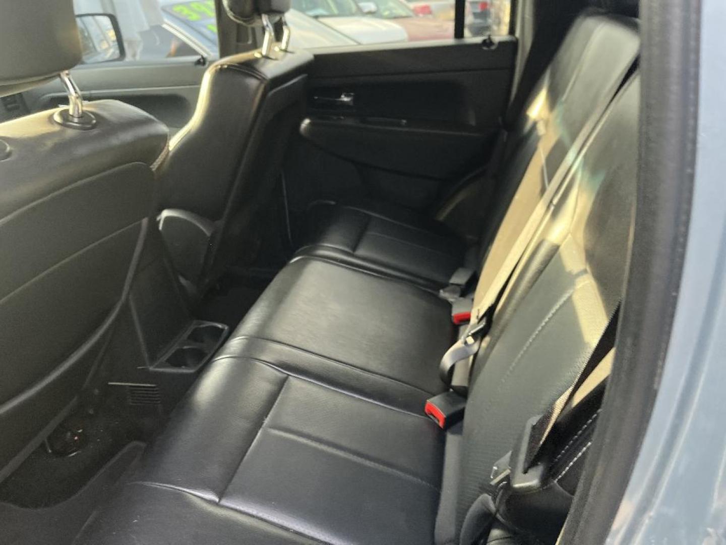 2012 BLUE JEEP LIBERTY Sport 4WD (1C4PJMAK8CW) with an 3.7L V6 SOHC 12V engine, AUTOMATIC transmission, located at 2303 West Mt. Houston, Houston, 77038, (281) 507-3956, 29.771597, -95.339569 - Photo#2