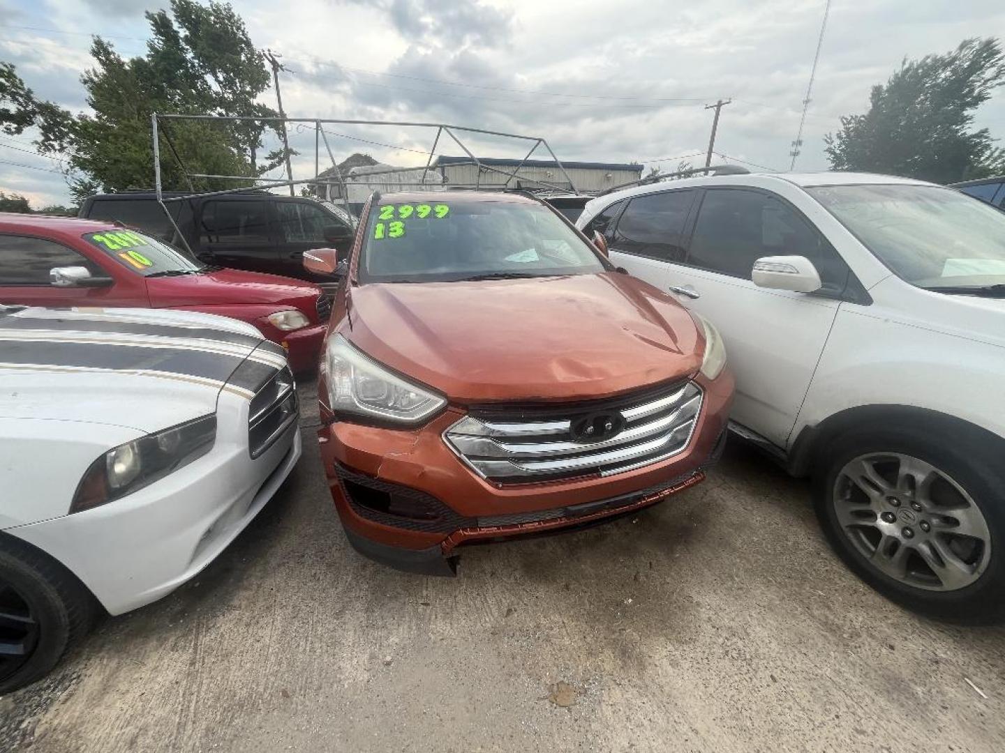 2013 ORANGE HYUNDAI SANTA FE Sport 2.4 FWD (5XYZU3LB7DG) with an 2.4L L4 DOHC 16V engine, AUTOMATIC transmission, located at 2303 West Mt. Houston, Houston, 77038, (281) 507-3956, 29.771597, -95.339569 - Photo#0