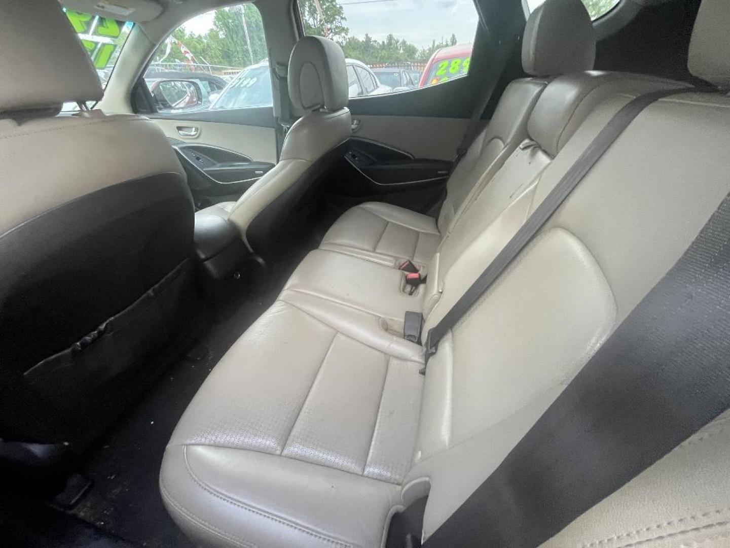2013 ORANGE HYUNDAI SANTA FE Sport 2.4 FWD (5XYZU3LB7DG) with an 2.4L L4 DOHC 16V engine, AUTOMATIC transmission, located at 2303 West Mt. Houston, Houston, 77038, (281) 507-3956, 29.771597, -95.339569 - Photo#2