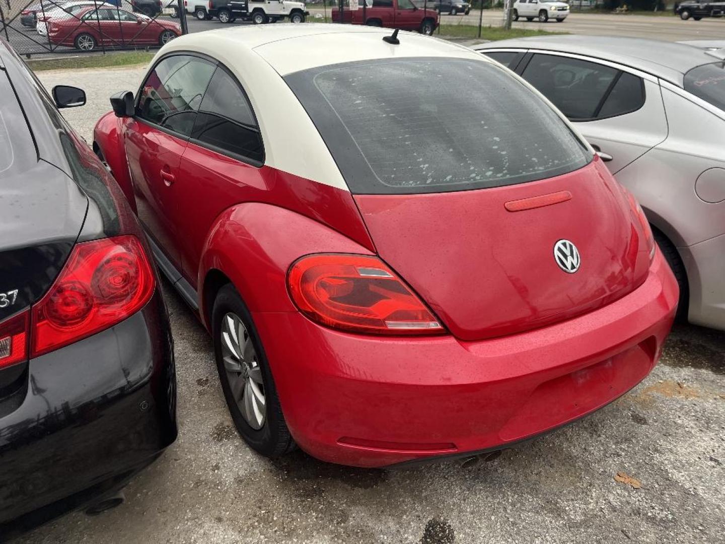2014 RED VOLKSWAGEN BEETLE 2.5L w/Sunroof Sound and Nav (3VWFP7AT4EM) with an 2.5L L5 DOHC 20V engine, AUTOMATIC transmission, located at 2303 West Mt. Houston, Houston, 77038, (281) 507-3956, 29.771597, -95.339569 - Photo#2