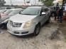 2015 GRAY CADILLAC SRX Luxury Collection FWD (3GYFNBE35FS) with an 3.6L V6 DOHC 24V FFV engine, AUTOMATIC transmission, located at 2303 West Mt. Houston, Houston, 77038, (281) 507-3956, 29.771597, -95.339569 - Photo#0