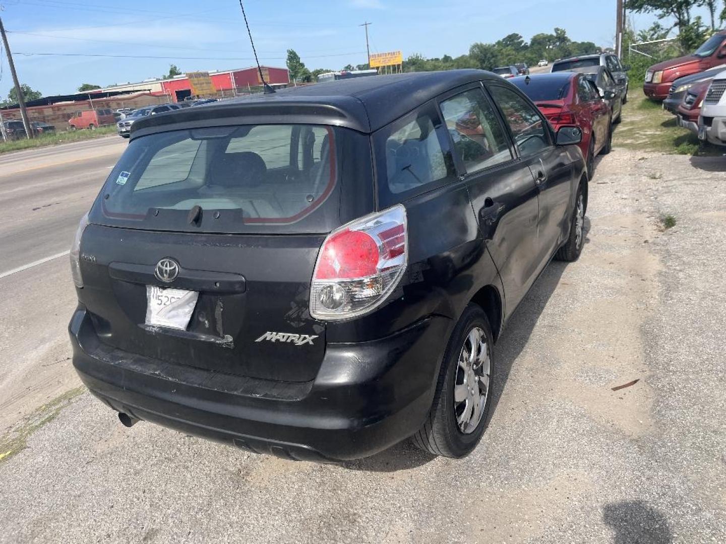 2005 BLACK TOYOTA MATRIX XR 2WD (2T1KR32E75C) with an 1.8L L4 DOHC 16V engine, AUTOMATIC transmission, located at 2303 West Mt. Houston, Houston, 77038, (281) 507-3956, 29.771597, -95.339569 - Photo#1
