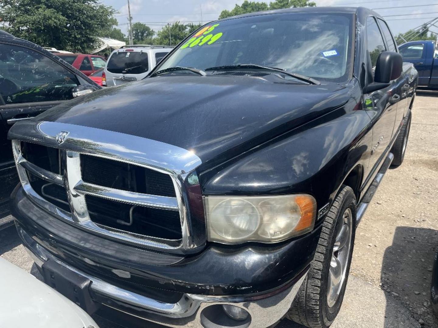 2005 BLACK DODGE RAM 1500 Laramie Quad Cab Long Bed 2WD (1D7HA18D35S) with an 5.7L V8 OHV 16V engine, AUTOMATIC transmission, located at 2303 West Mt. Houston, Houston, 77038, (281) 507-3956, 29.771597, -95.339569 - Photo#0