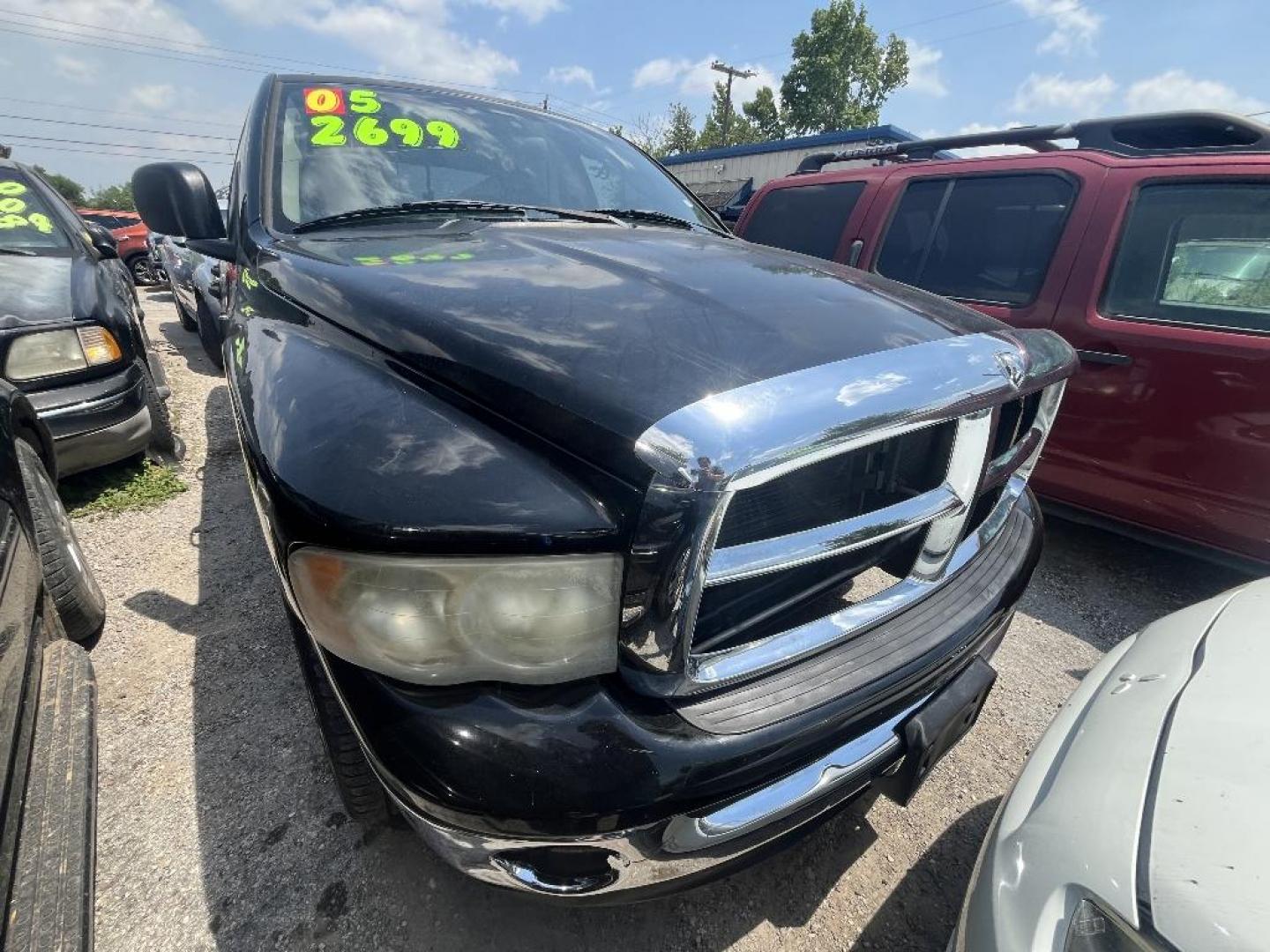 2005 BLACK DODGE RAM 1500 Laramie Quad Cab Long Bed 2WD (1D7HA18D35S) with an 5.7L V8 OHV 16V engine, AUTOMATIC transmission, located at 2303 West Mt. Houston, Houston, 77038, (281) 507-3956, 29.771597, -95.339569 - Photo#1