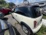 2006 WHITE MINI COOPER Base (WMWRC33536T) with an 1.6L L4 OHC 16V engine, MANUAL transmission, located at 2303 West Mt. Houston, Houston, 77038, (281) 507-3956, 29.771597, -95.339569 - Photo#3