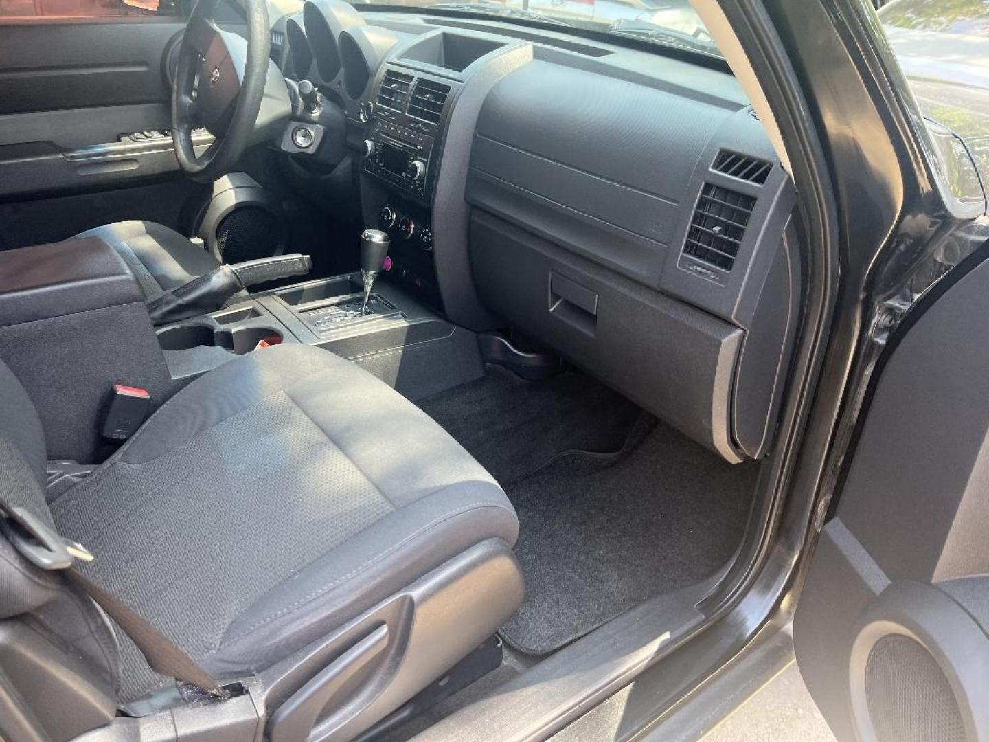 2011 BLACK DODGE NITRO Heat 2WD (1D4PT4GK3BW) with an 3.7L V6 SOHC 12V engine, AUTOMATIC transmission, located at 2303 West Mt. Houston, Houston, 77038, (281) 507-3956, 29.771597, -95.339569 - Photo#2