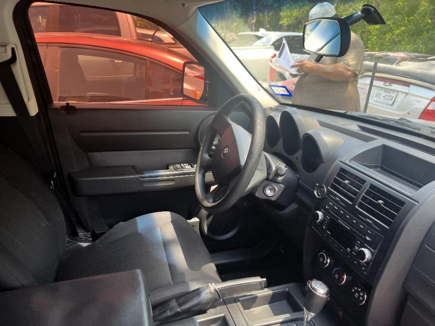 2011 BLACK DODGE NITRO Heat 2WD (1D4PT4GK3BW) with an 3.7L V6 SOHC 12V engine, AUTOMATIC transmission, located at 2303 West Mt. Houston, Houston, 77038, (281) 507-3956, 29.771597, -95.339569 - Photo#3