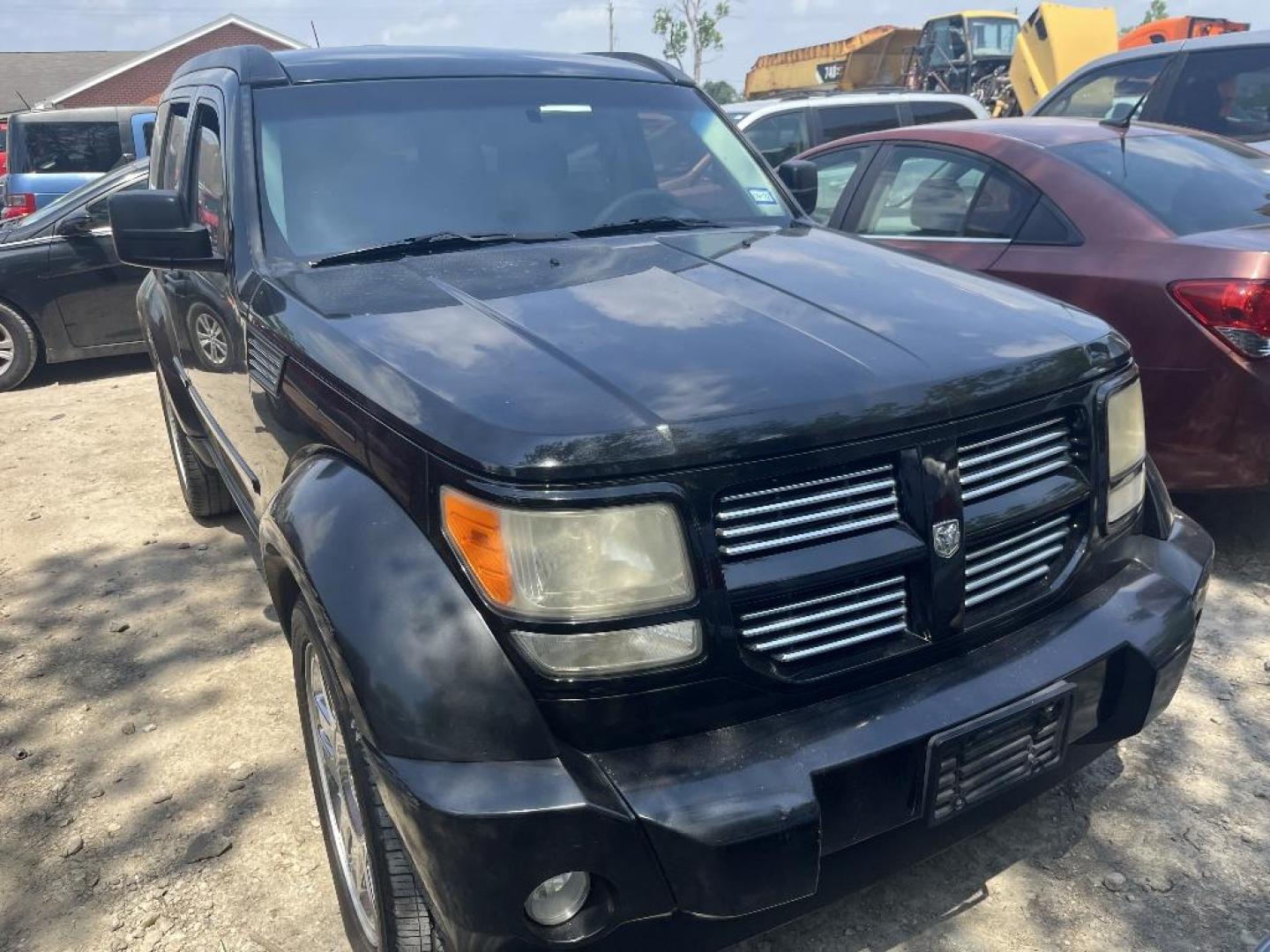 2011 BLACK DODGE NITRO Heat 2WD (1D4PT4GK3BW) with an 3.7L V6 SOHC 12V engine, AUTOMATIC transmission, located at 2303 West Mt. Houston, Houston, 77038, (281) 507-3956, 29.771597, -95.339569 - Photo#5