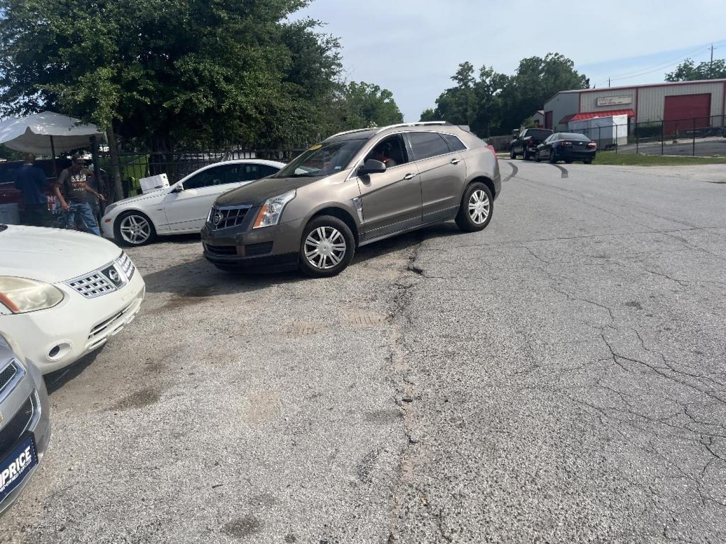 2012 BROWN CADILLAC SRX Luxury (3GYFNAE3XCS) with an 3.6L V6 DOHC 24V FFV engine, AUTOMATIC transmission, located at 2303 West Mt. Houston, Houston, 77038, (281) 507-3956, 29.771597, -95.339569 - Photo#3