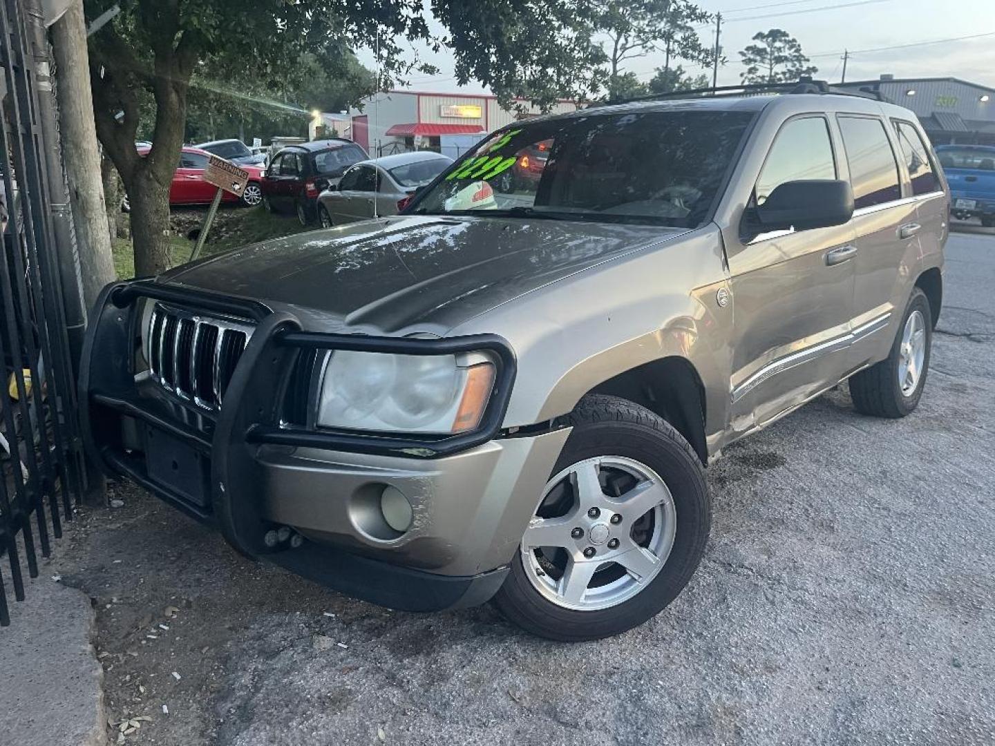 2005 BROWN JEEP GRAND CHEROKEE Limited 4WD (1J4HR58N45C) with an 4.7L V8 SOHC 16V engine, AUTOMATIC transmission, located at 2303 West Mt. Houston, Houston, 77038, (281) 507-3956, 29.771597, -95.339569 - Photo#0