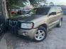 2005 BROWN JEEP GRAND CHEROKEE Limited 4WD (1J4HR58N45C) with an 4.7L V8 SOHC 16V engine, AUTOMATIC transmission, located at 2303 West Mt. Houston, Houston, 77038, (281) 507-3956, 29.771597, -95.339569 - Photo#0