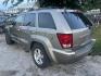 2005 BROWN JEEP GRAND CHEROKEE Limited 4WD (1J4HR58N45C) with an 4.7L V8 SOHC 16V engine, AUTOMATIC transmission, located at 2303 West Mt. Houston, Houston, 77038, (281) 507-3956, 29.771597, -95.339569 - Photo#1