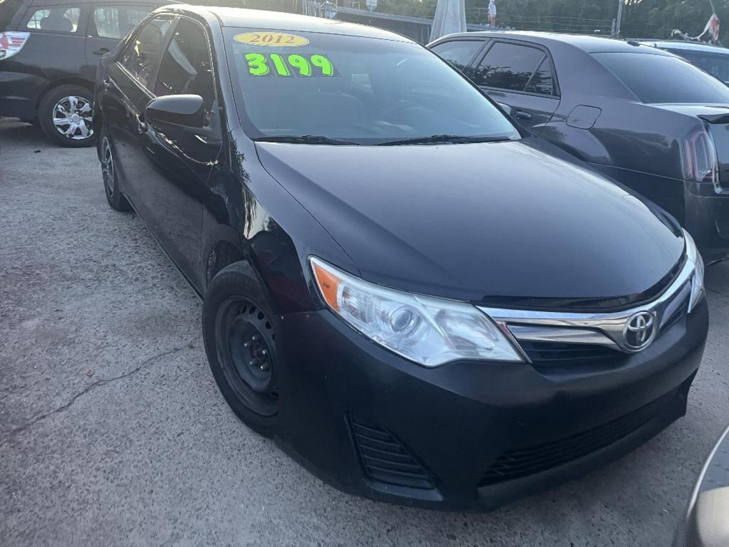 2012 BLACK TOYOTA CAMRY SE (4T4BF1FK7CR) with an 2.5L L4 DOHC 16V engine, AUTOMATIC transmission, located at 2303 West Mt. Houston, Houston, 77038, (281) 507-3956, 29.771597, -95.339569 - Photo#0