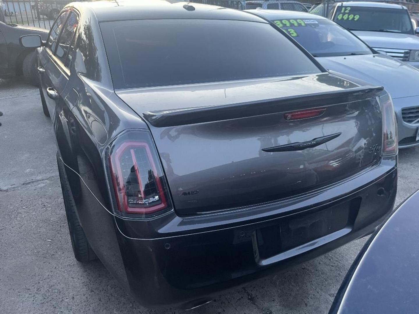 2014 GRAY CHRYSLER 300 S V6 AWD (2C3CCAGG0EH) with an 3.6L V6 DOHC 24V engine, AUTOMATIC transmission, located at 2303 West Mt. Houston, Houston, 77038, (281) 507-3956, 29.771597, -95.339569 - Photo#1
