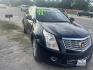 2012 BLACK CADILLAC SRX Luxury (3GYFNAE34CS) with an 3.6L V6 DOHC 24V FFV engine, AUTOMATIC transmission, located at 2303 West Mt. Houston, Houston, 77038, (281) 507-3956, 29.771597, -95.339569 - Photo#0