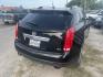 2012 BLACK CADILLAC SRX Luxury (3GYFNAE34CS) with an 3.6L V6 DOHC 24V FFV engine, AUTOMATIC transmission, located at 2303 West Mt. Houston, Houston, 77038, (281) 507-3956, 29.771597, -95.339569 - Photo#1